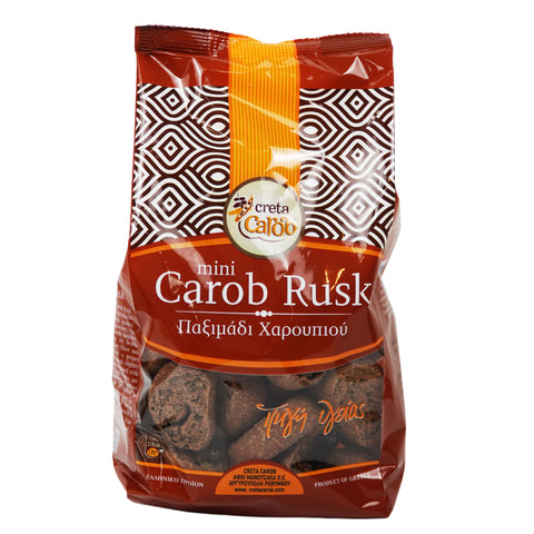 Carob Mini Rusk – knuspriger, kleiner Zwieback mit natürlichem Johannisbrotgeschmack, ideal als mediterraner Snack oder Beilage.